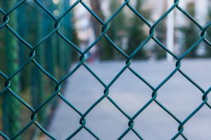 Coated chain link fence